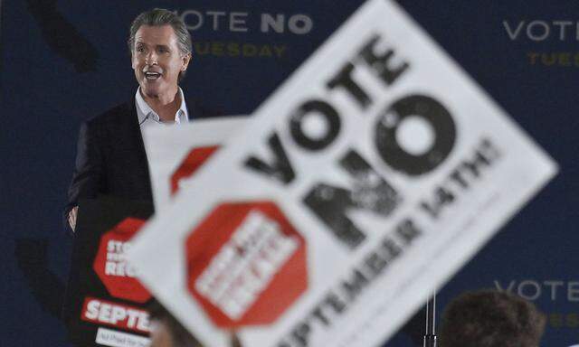 California Gov. Gavin Newsom addresses supporters urging voters to vote no in Tuesday s recall election, saying, Tomorr