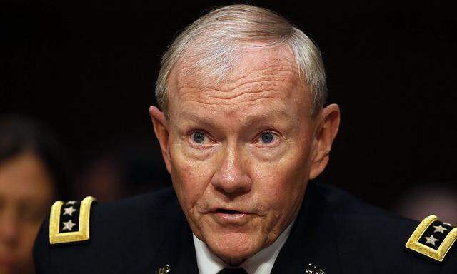 File photo of Chairman of the Joint Chiefs General Martin Dempsey  testifying at a Senate Armed Services Committee in Washington