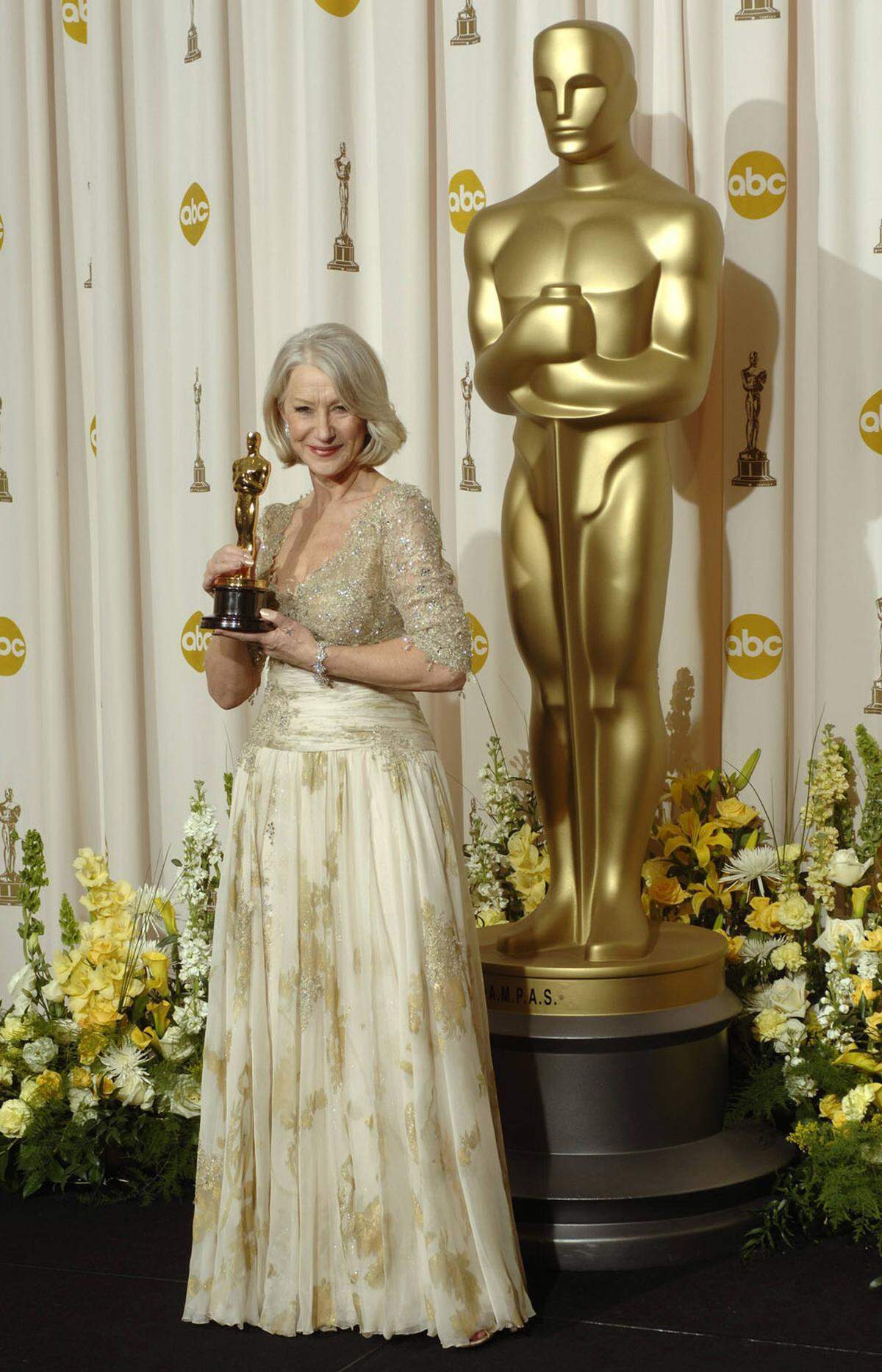 Gold in Gold: Helen Mirren gewann 2007 für "Die Queen". Sie trug ein Kleid von Christian Lacroix.