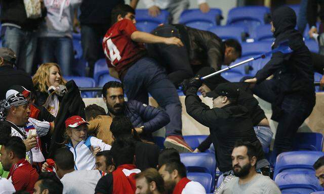 Besiktas and Lyon fans clash in the stands