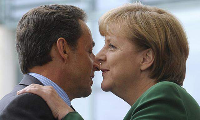 Die deutsche Bundeskanzlerin Angela Merkel und Frankreichs Präsident Nicolas Sarkozy