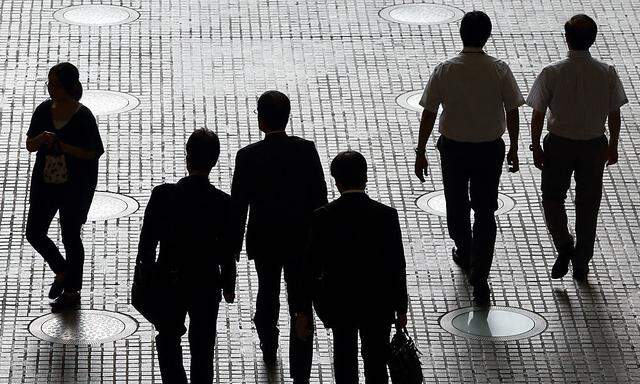 Workers In Central Business District As Japan Releases Jobless Rate Figures