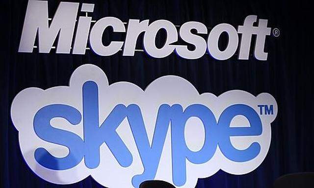 A Microsoft and Skype sign are displayed at a news conference in San Francisco Tuesday, May 10, 2011,