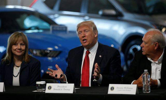 FILE PHOTO: Trump talks with auto industry leaders, including Barra and Williams at the American Center for Mobility in Ypsilanti Township