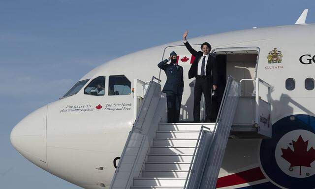 June 10, 2021, Ottawa, on, Canada: Prime Minister Justin Trudeau waves as he boards a government plane at the airport in