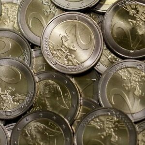 Two Euro coins are seen in the Austrian Mint headquarters in Vienna