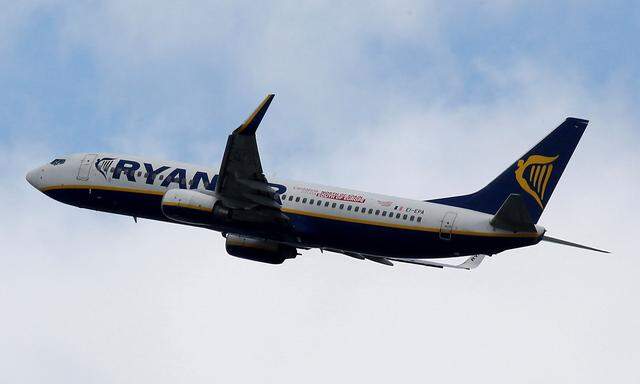 FILE PHOTO: A Ryanair commercial passenger jet takes off in Blagnac near Toulouse