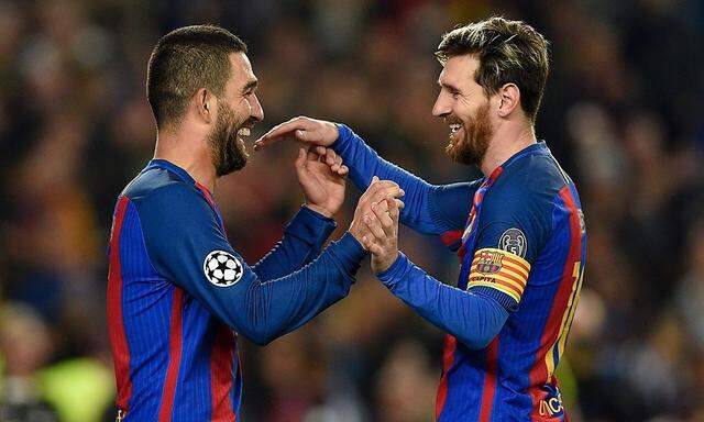 Arda Turan und Lionel Messi