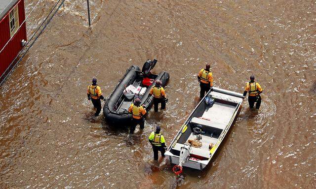 Rescuers patrol in floodwater caused by Hurricane Florence in Lumberton