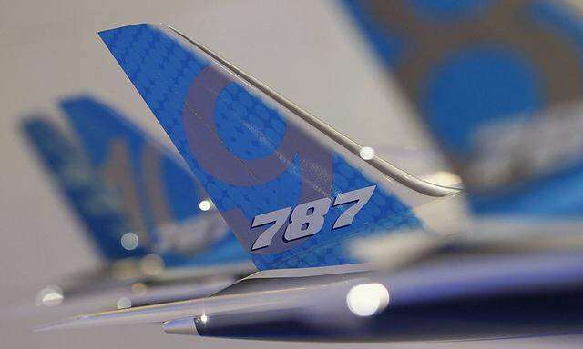 Tailwing of a model Boeing 787 Dreamliner aircraft is pictured at the Boeing booth at the Singapore Airshow