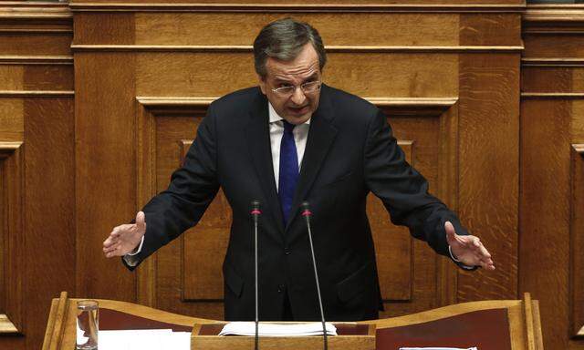 Greece´s Prime Minister Samaras addresses lawmakers  before a confidence vote for the country´s coalition government in Athens