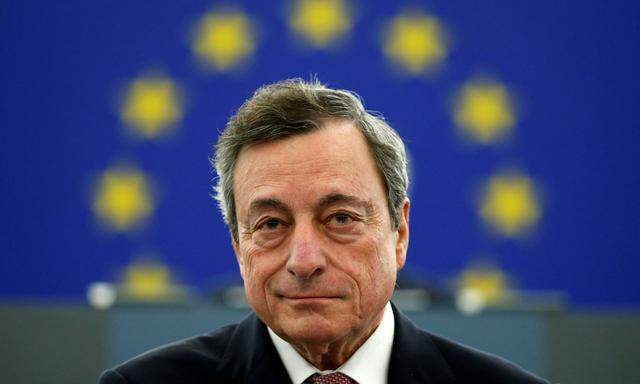 FILE PHOTO: ECB President Draghi delivers a speech during a ceremony to mark the 20th anniversary of the launch of the Euro, at the European Parliament in Strasbourg