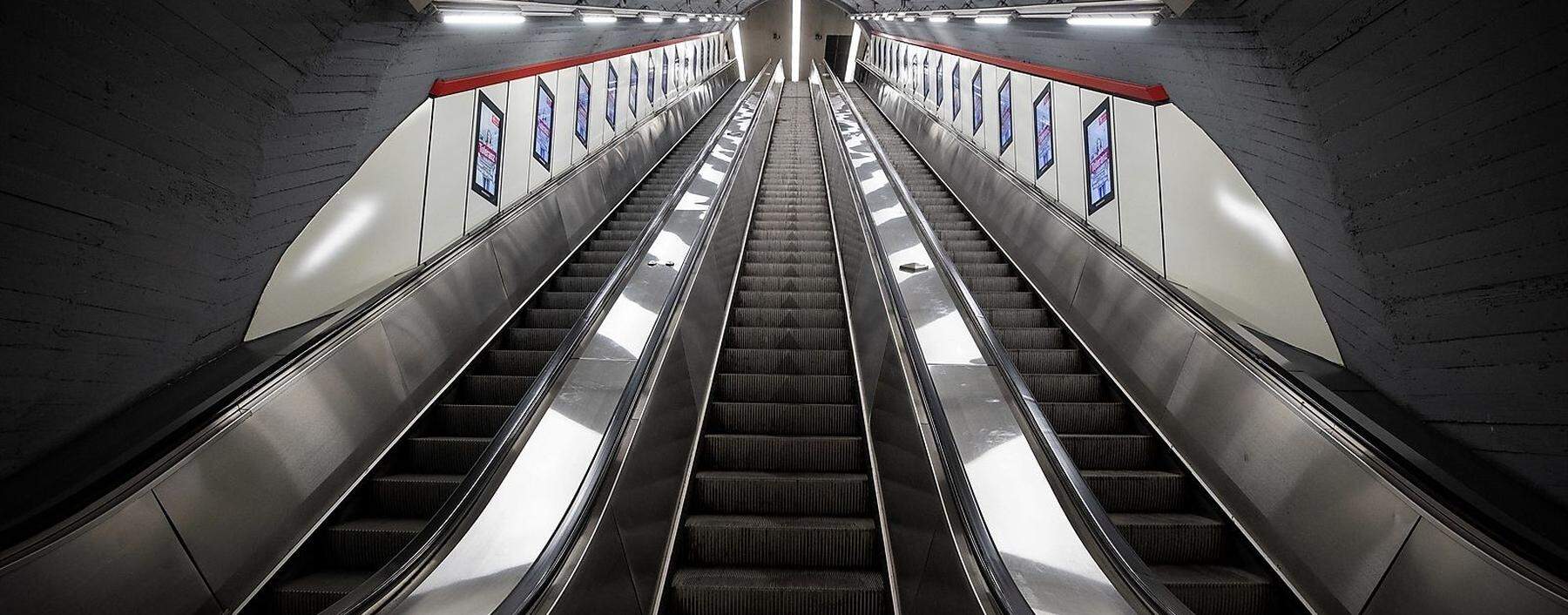 An empty escalator is seen at ´Karlsplatz“ underground station during the coronavirus disease (COVID-19) outbreak in Vienna