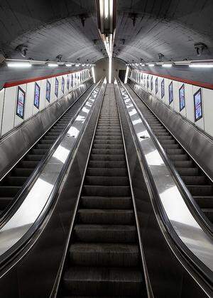 An empty escalator is seen at ´Karlsplatz“ underground station during the coronavirus disease (COVID-19) outbreak in Vienna