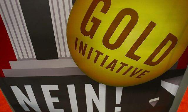 Poster in favour of 'No' vote for the 'Save our Swiss gold' referendum is displayed before a news conference in Bern