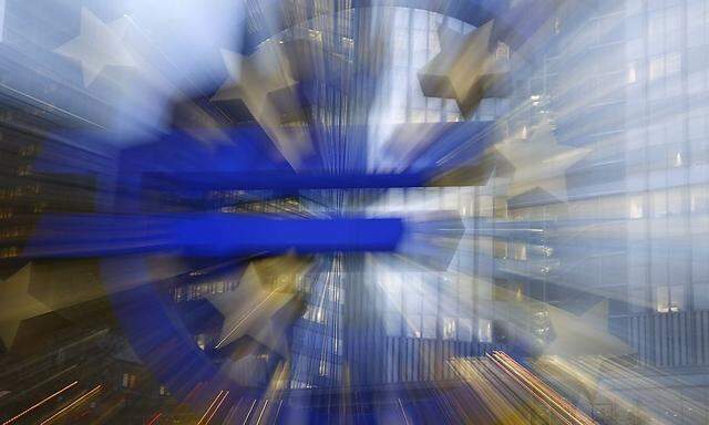 The euro sculpture is seen outside the head quarters of the European Central Bank in Frankfurt