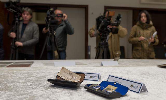 German police presents stolen diaries and other items belonging to former Beatle John Lennon that were recovered, during a news conference in Berlin