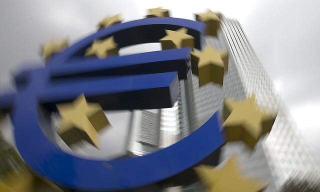 A euro logo sculpture stands in front the headquarters of the European Central Bank  in Frankfurt