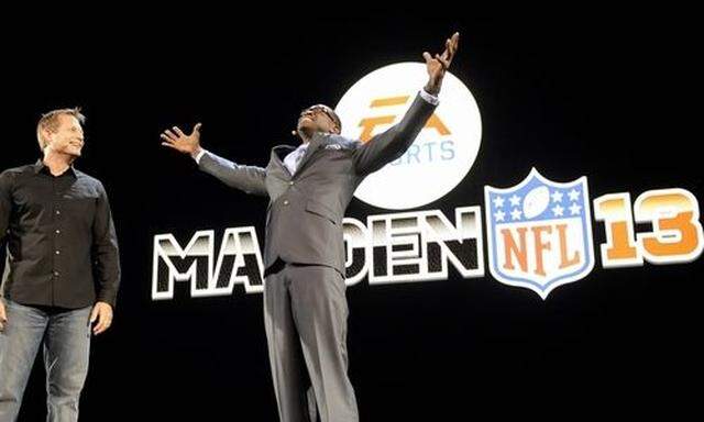 GM of Electronic Arts Sports Football Weber and former Dallas Cowboy wide receiver Irvin unveil Madde