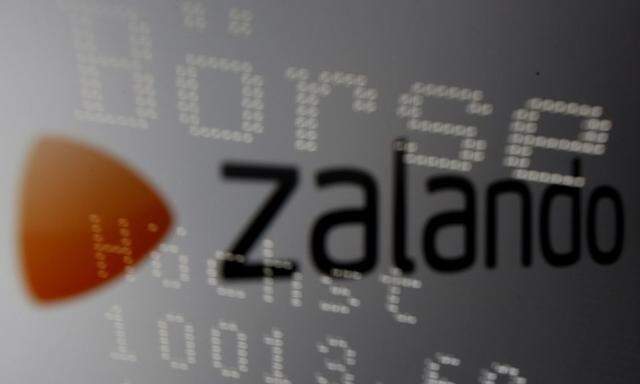 German stock market graph reflected on an iPad display showing Zalando logo picture illustration