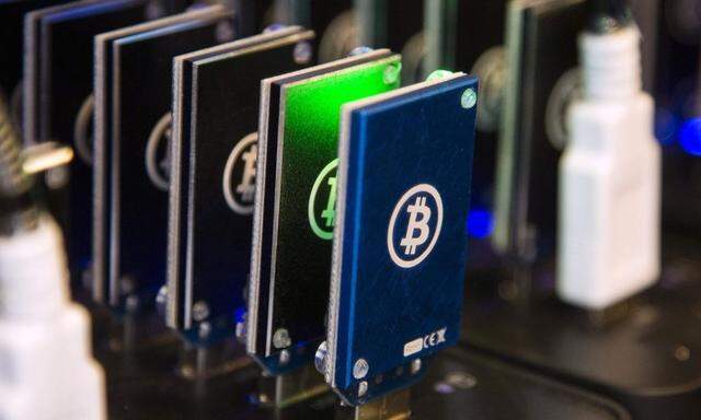 Chain of block erupters used for Bitcoin mining is pictured at the Plug and Play Tech Center in Sunnyvale, California