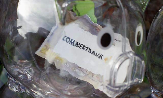 File photo of Commerzbank logo inside a transparent plastic piggy bank