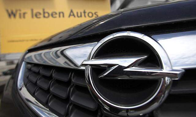 An Opel logo is pictured in front of the Opel headquarters in Ruesselsheim