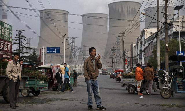 2000 Kohlekraftwerke produzieren den Strom für Chinas ökonomische Aufholjagd. Und sie sorgen für fast 40 Prozent der CO2-Emissionen des Landes. 