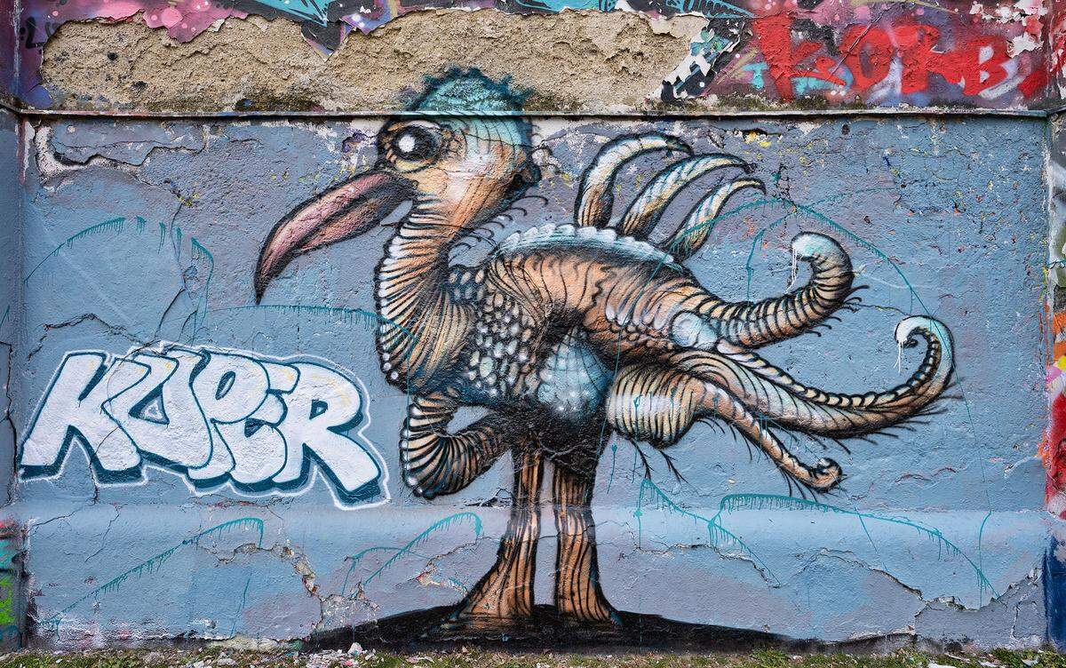 Graffito von Kuper an der Roßauer Lände der Wienerwand [aufgenommen am 4.3.2022]