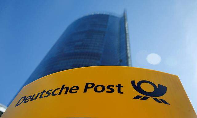 FILE PHOTO: A Deutche Post sign stands in front of the Bonn Post Tower in Bonn