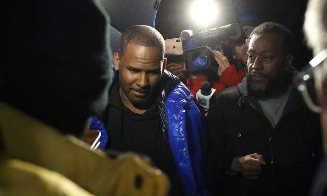 February 22 2019 Chicago IL USA R Kelly emerges from his Chicago studio on Friday Feb 22
