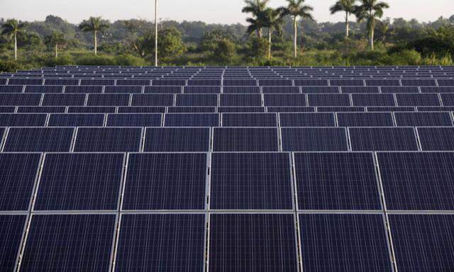 Solar panels donated by China are seen at a park in Havana