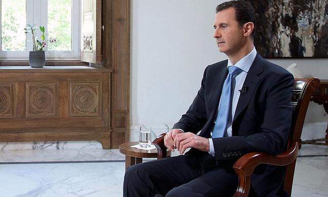 Archivbild eines TV-Interviews mit Syriens Präsident Bashar al-Assad.