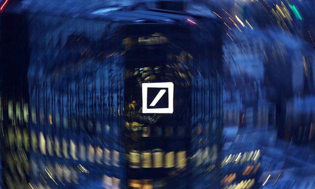 FILE PHOTO: The head quarters of Germany's Deutsche Bank are photographed early evening in Frankfurt