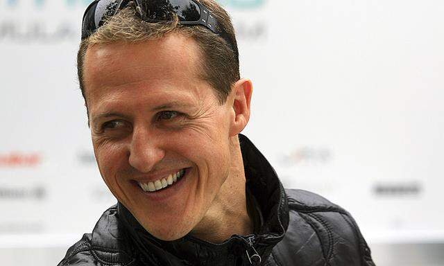 File photo of F1 driver Schumacher of Germany smiling in Melbourne