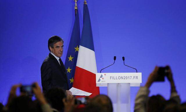 Francois Fillon, member of the Republicans political party and 2017 presidential election candidate of the French centre-right, arrives to make a declaration to the media at his campaign headquarters in Pari