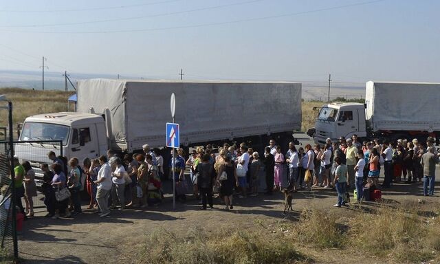 ITAR TASS ROSTOV REGION RUSSIA AUGUST 23 2014 The first KAMaz trucks of the 280 strong convoy s