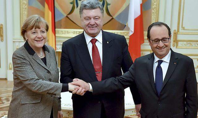 Gipfeltreffen in Kiew: Merkel, Poroschenko, Hollande.