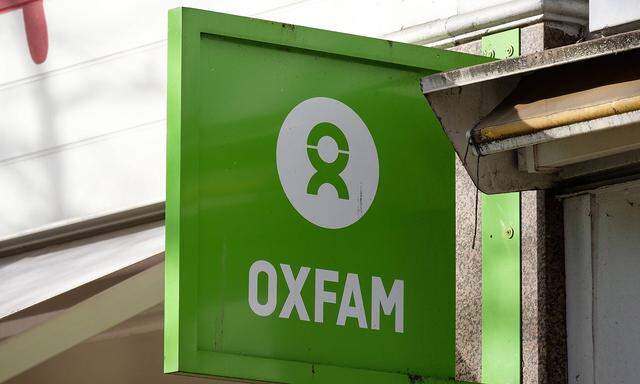 February 12 2018 London London UK An Oxfam charity store in Ealing Oxfam is engulfed in a sc