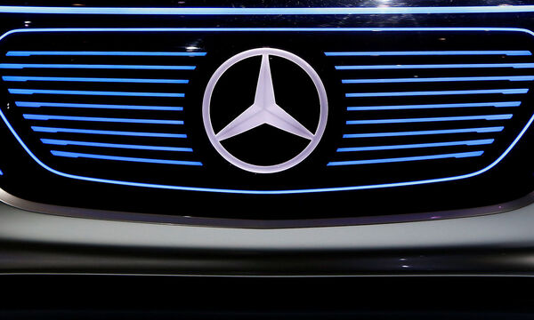 FILE PHOTO:The Mercedes logo is pictured before the annual news conference of Daimler AG in Stuttgart