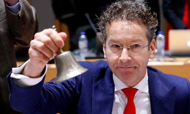 FILE PHOTO: Eurogroup President Dijsselbloem rings the bell as he chairs a Eurozone finance ministers meeting in Brussels