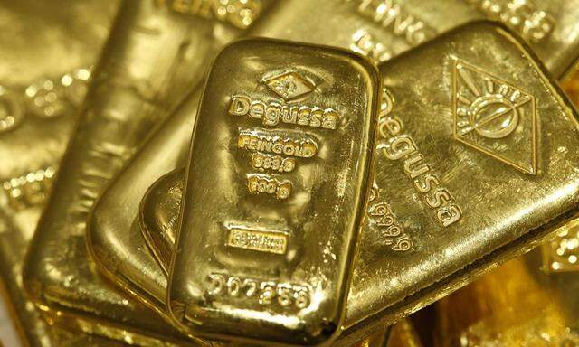Gold bars are seen in the vault of the branch office of precious metal trader Degussa in Zurich