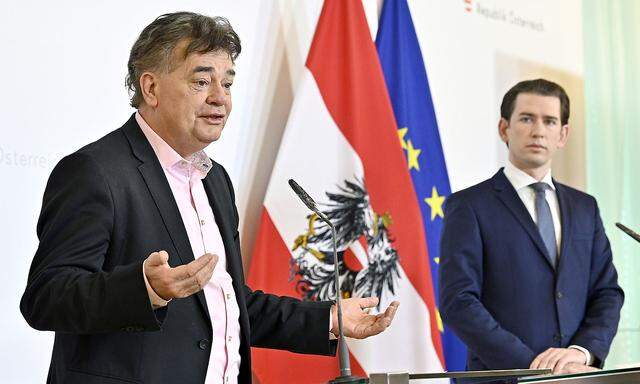 Austrian Chancellor Sebastian Kurz and Vice-Chancellor Werner Kogler attend a news conference as the spread of coronavirus disease (COVID-19) continues in Vienna