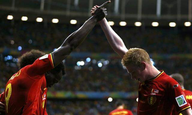 Belgium's Romelu Lukaku celebrates with Kevin De Bruyne after scoring a goal during extra time in the 2014 World Cup round of 16 game between Belgium and the U.S. at the Fonte Nova arena