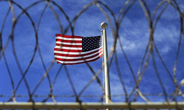 The U.S. flag flies over Camp VI, a prison used to house detainees at the U.S. Naval Base at Guantanamo Bay