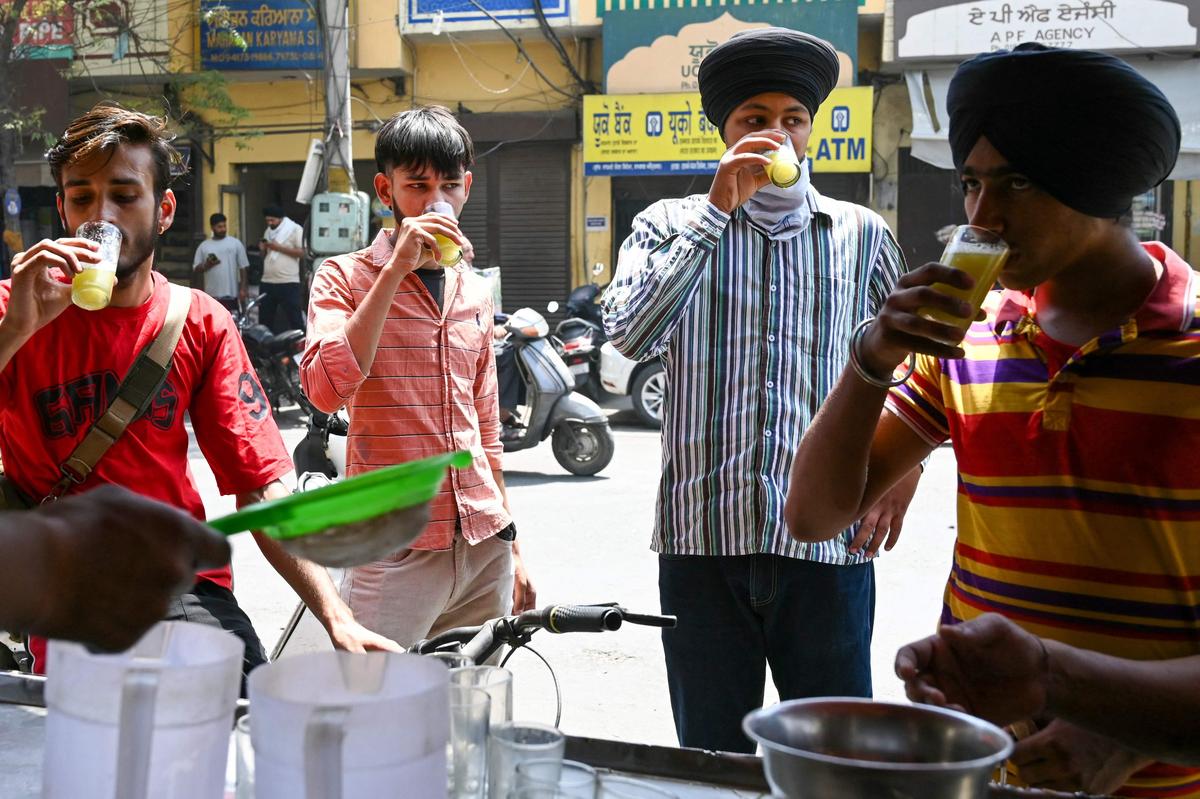 Refreshment with sugarcane juice in the northwestern Indian city of Amritsar. 