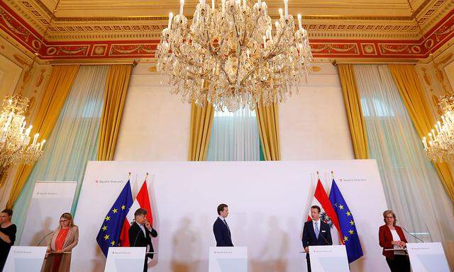 Austrian Chancellor Sebastian Kurz and Vice Chancellor Werner Kogler attend a news conference, following an outbreak of the coronavirus disease (COVID-19), in Vienna