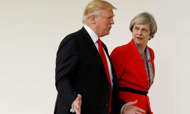 FILE PHOTO - U.S. President Trump escorts British Prime Minister May after their meeting at the White House in Washington