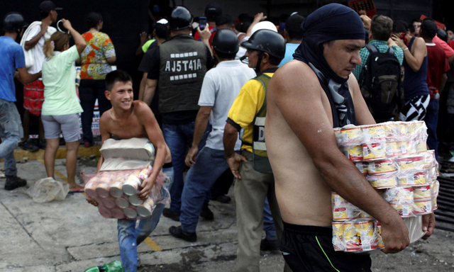Ärger über missglückten Geldscheinumtausch. Im Landesinneren Venezuelas wurden Geschäfte geplündert.  
