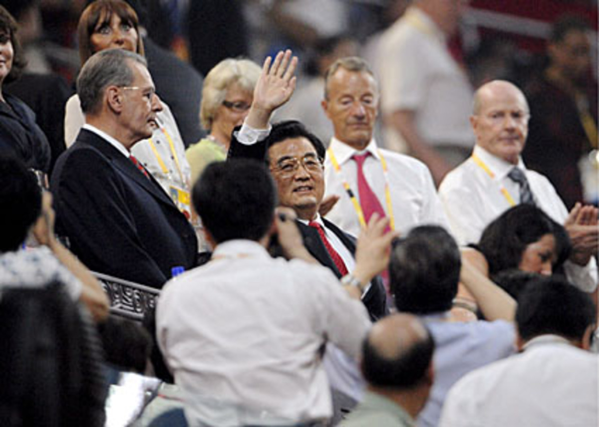 Chinas Präsident Hu Jintao genoss das Stehen im Rampenlicht. Neben ihm IOC-Präsident Jacques Rogge.